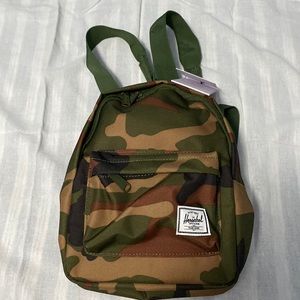 Brand new mini backpack.